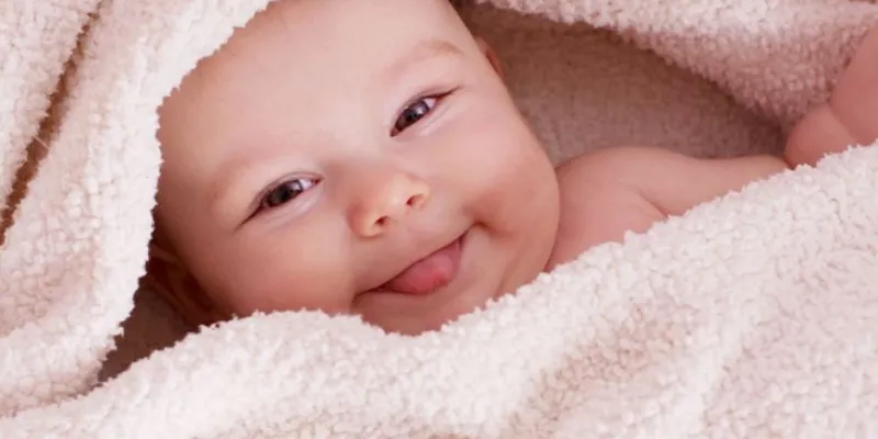 Mơ thấy bế con nít